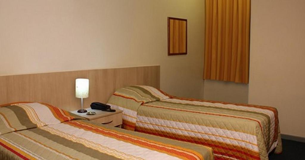 Euro Hotel Курітіба Номер фото